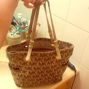 Medium brown and tan MK tote gently worn